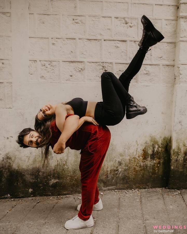 A female and male contemporary dancer performing a dramatic pose in front  of a dark background Stock Photo by YuriArcursPeopleimages