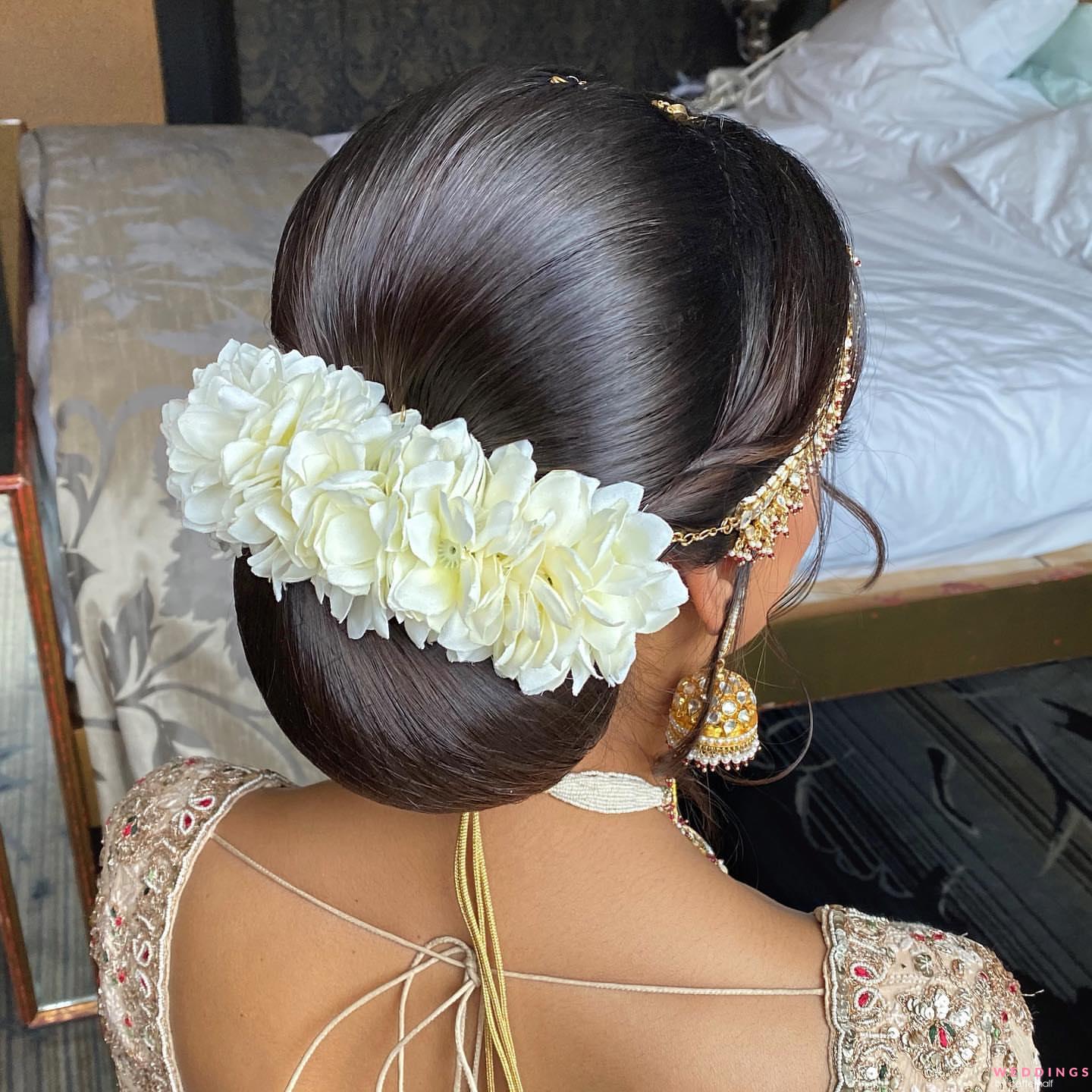 Bridal Buns Hairstyles For Indian Brides | Bridal bun, Flowers in hair,  Flower bun