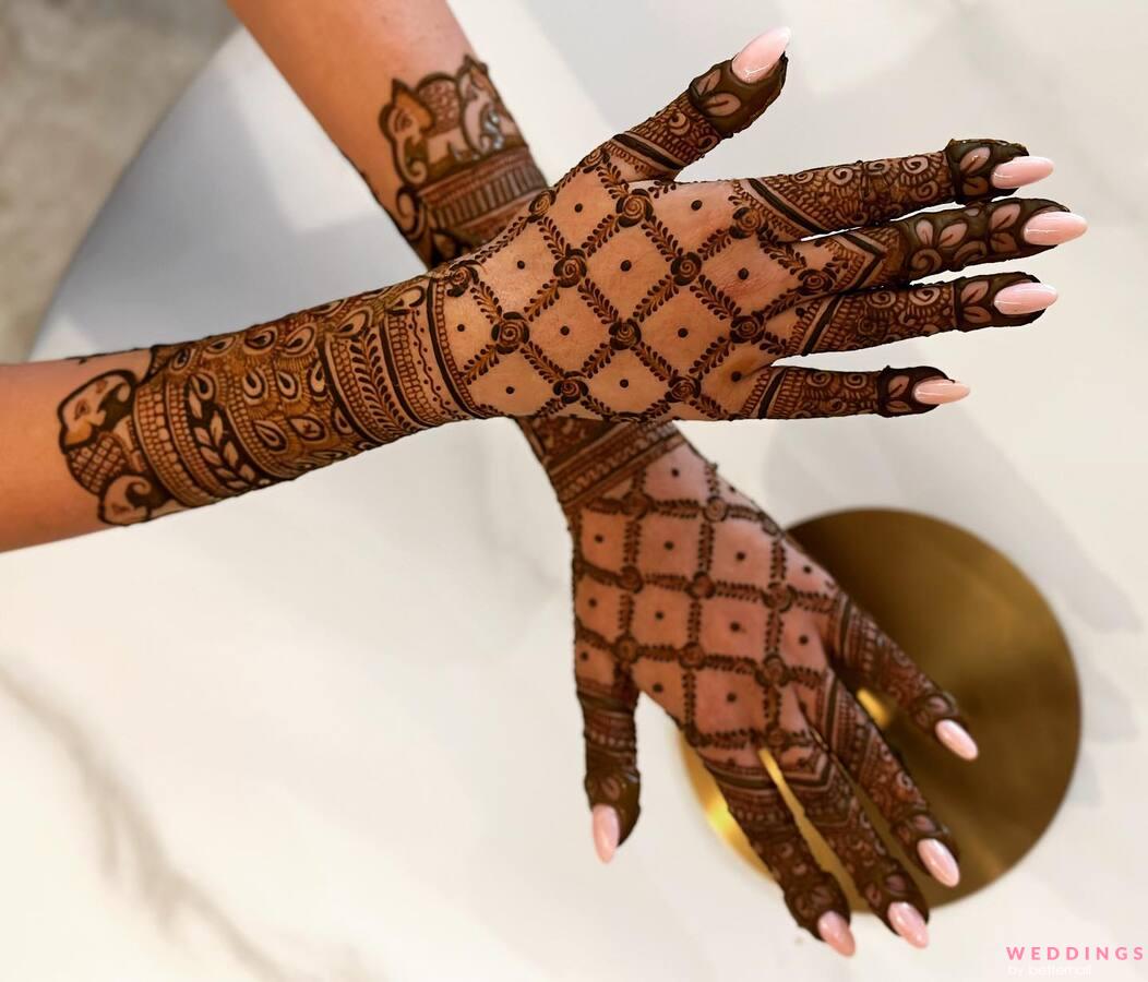 Elegant Short Mehndi Design on Back Hand & Fingers