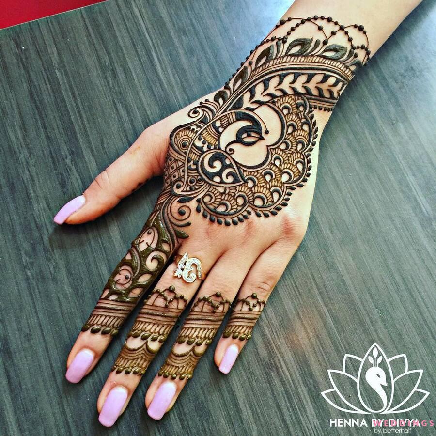 peacock mehndi design for back hand - mehndi designs easy and beautiful ...  | Henna tattoo designs, Latest mehndi designs, Indian mehndi designs