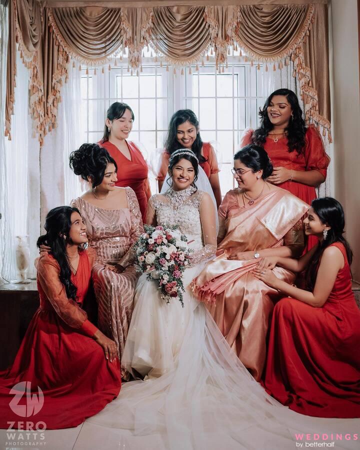 a bride in traditional indian attire poses with her bridesmaids.  AI-Generated 31858471 Stock Photo at Vecteezy