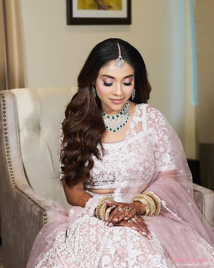 Brides, take Rashmika Mandanna's sequinned gold lehenga to your sangeet  celebrations | Vogue India | Wedding Wardrobe