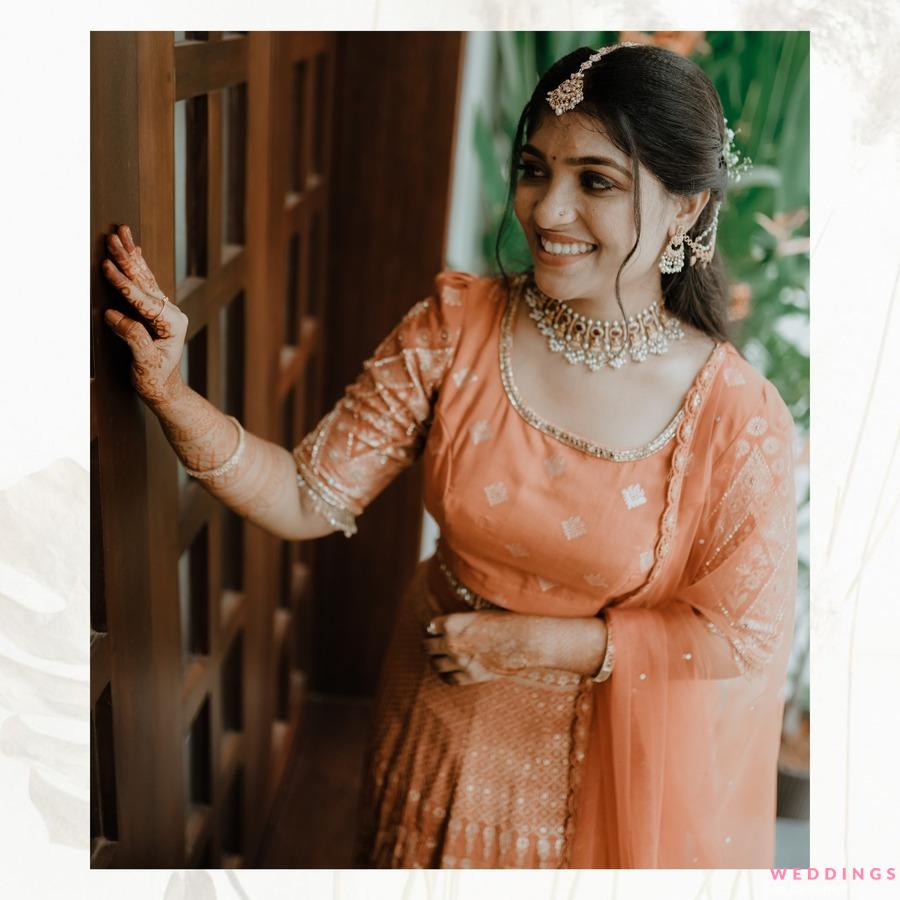 A beautiful Indian girl in a indo western dress. Fashionable look. Clothes  and accessories. Young woman in traditional Indian costume lehenga choli  with fashionable hairstyle poses Stock Photo | Adobe Stock