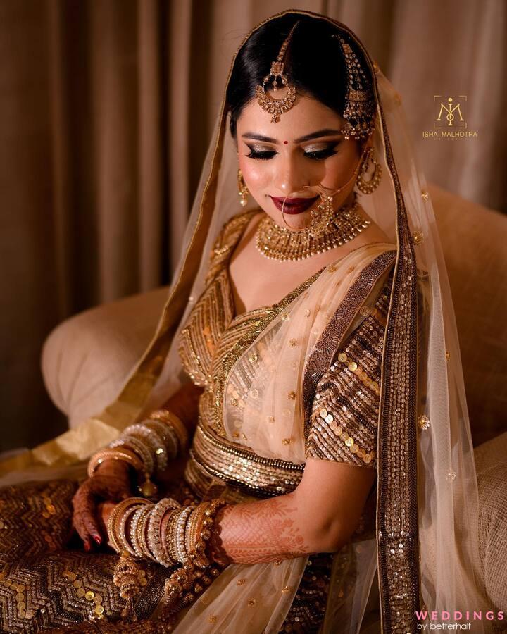 Indian Brides In Gold Wedding Lehengas That Made a WOW Impression - Wish N  Wed