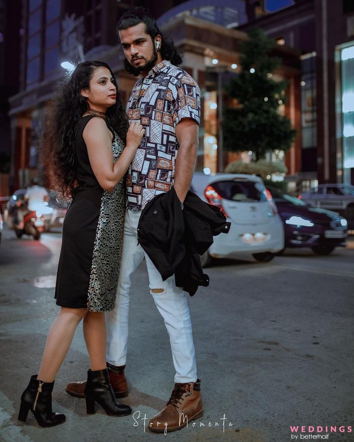 Young trendy man and woman models posing of the modern street. Fashion  Style. Stock Photo by ©flashvector 112034388