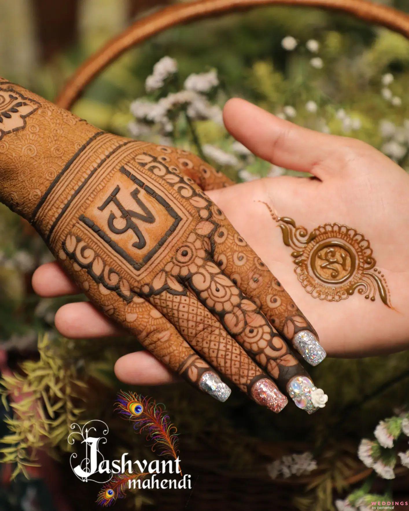 Mehndi design of the Indian bride and groom | Photo 227699