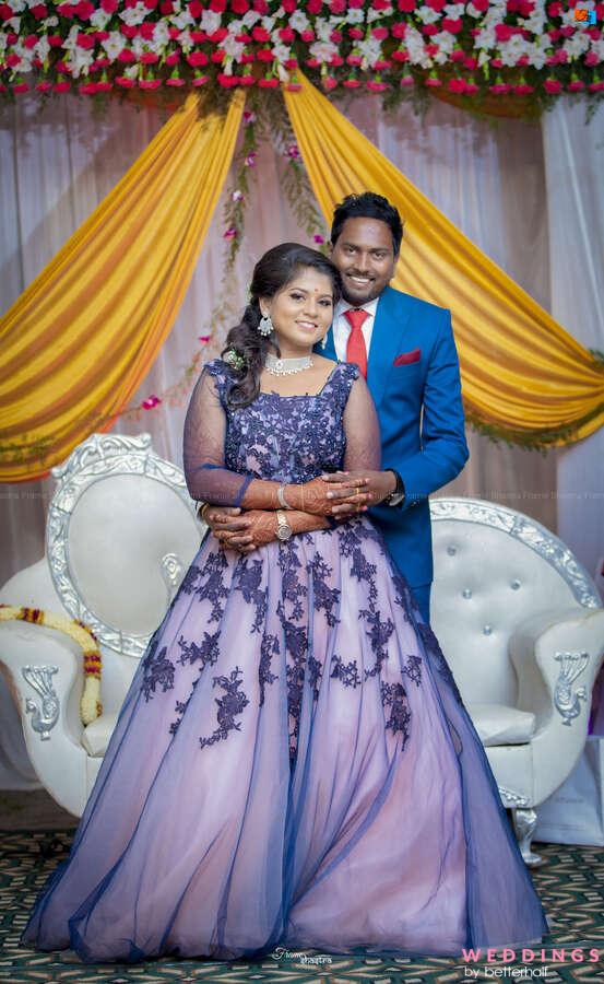 Elegant Indian couple posing with reception outfits. | Photo 241589