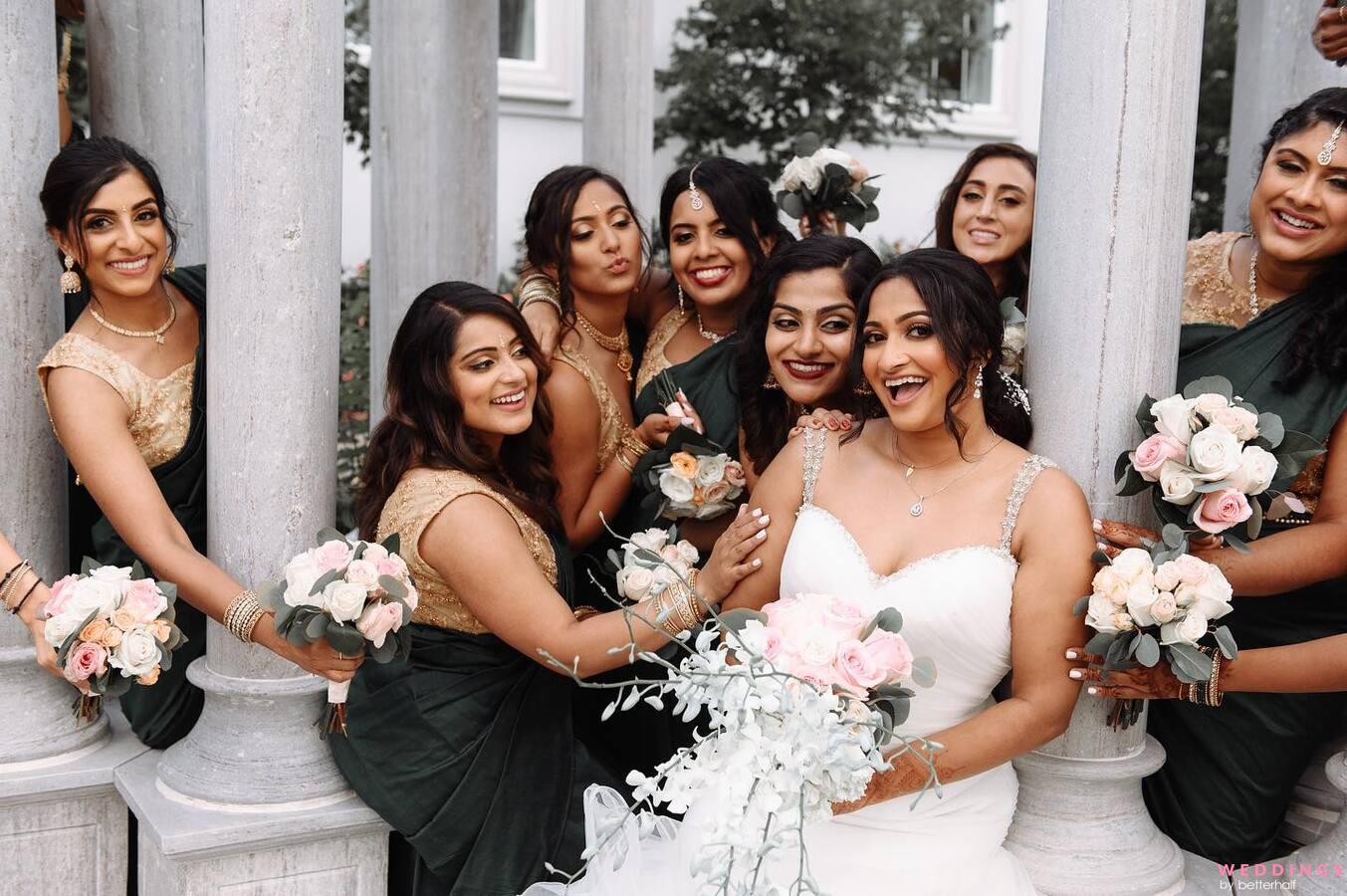 a woman in traditional indian attire poses with her bridesmaids.  AI-Generated 31515839 Stock Photo at Vecteezy