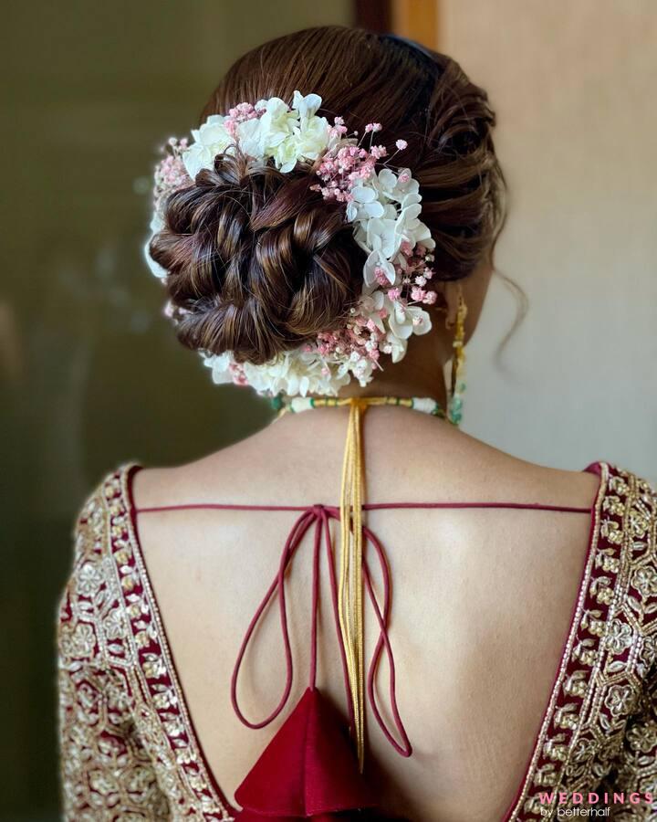 Floral bun wedding hairstyles - ShaadiWish