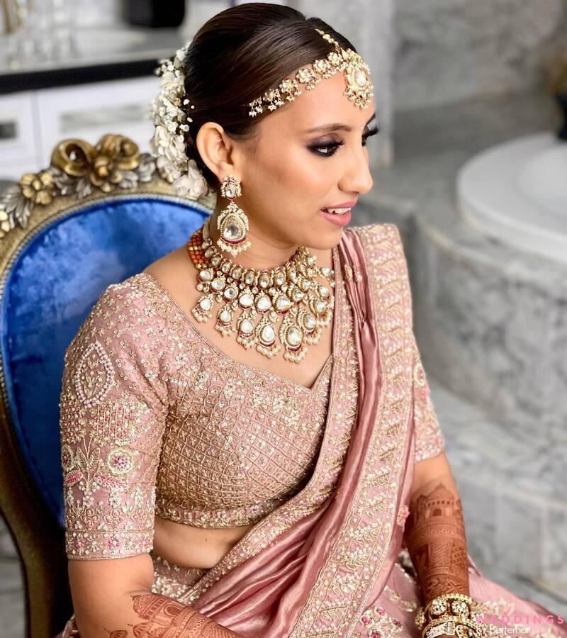 Peach outfit with golden work | Bridal makeup images, Bride, Best bridal  makeup