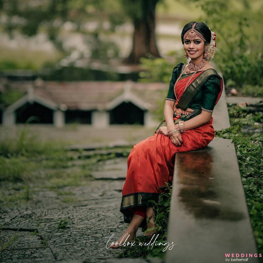 Image of Indian traditional Beautiful Woman Wearing an traditional Saree  And Posing On The Outdoor With a Smile Face-RU113379-Picxy