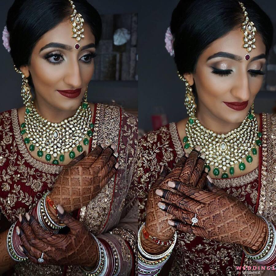 Beautiful Traditional Indian Bride Getting Ready For Her Wedding Day The  Makeup Front Of A Mirror Stock Photo - Download Image Now - iStock