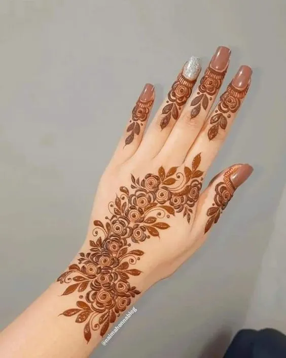 Photo of Floral Arabic mehndi design for back hand